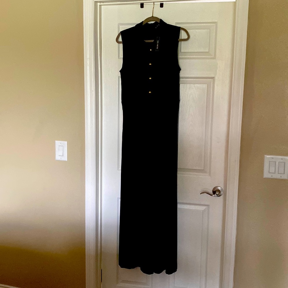 Dressy/party pants jumpsuit with gold (fake) buttons.  Jumpsuit unzips in back.